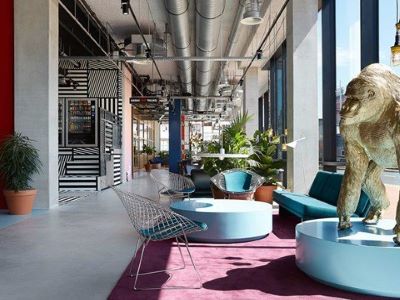 The Student Hotel Groningen Lobby Area With Gorilla And Bue Tables